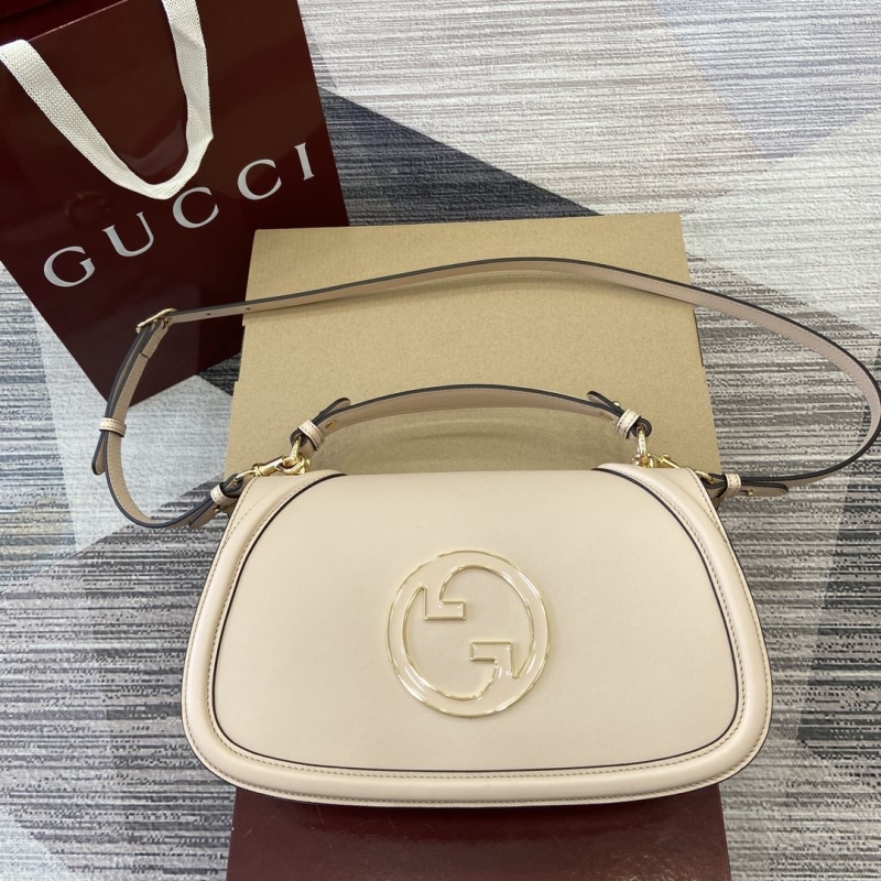 G*u*i top handle bags